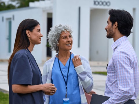 Doctors outside office talking