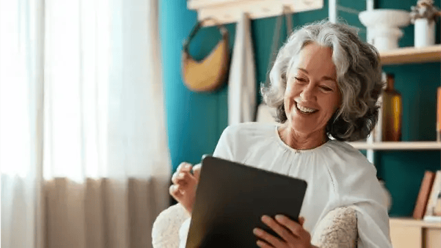 Middle age women using a tablet